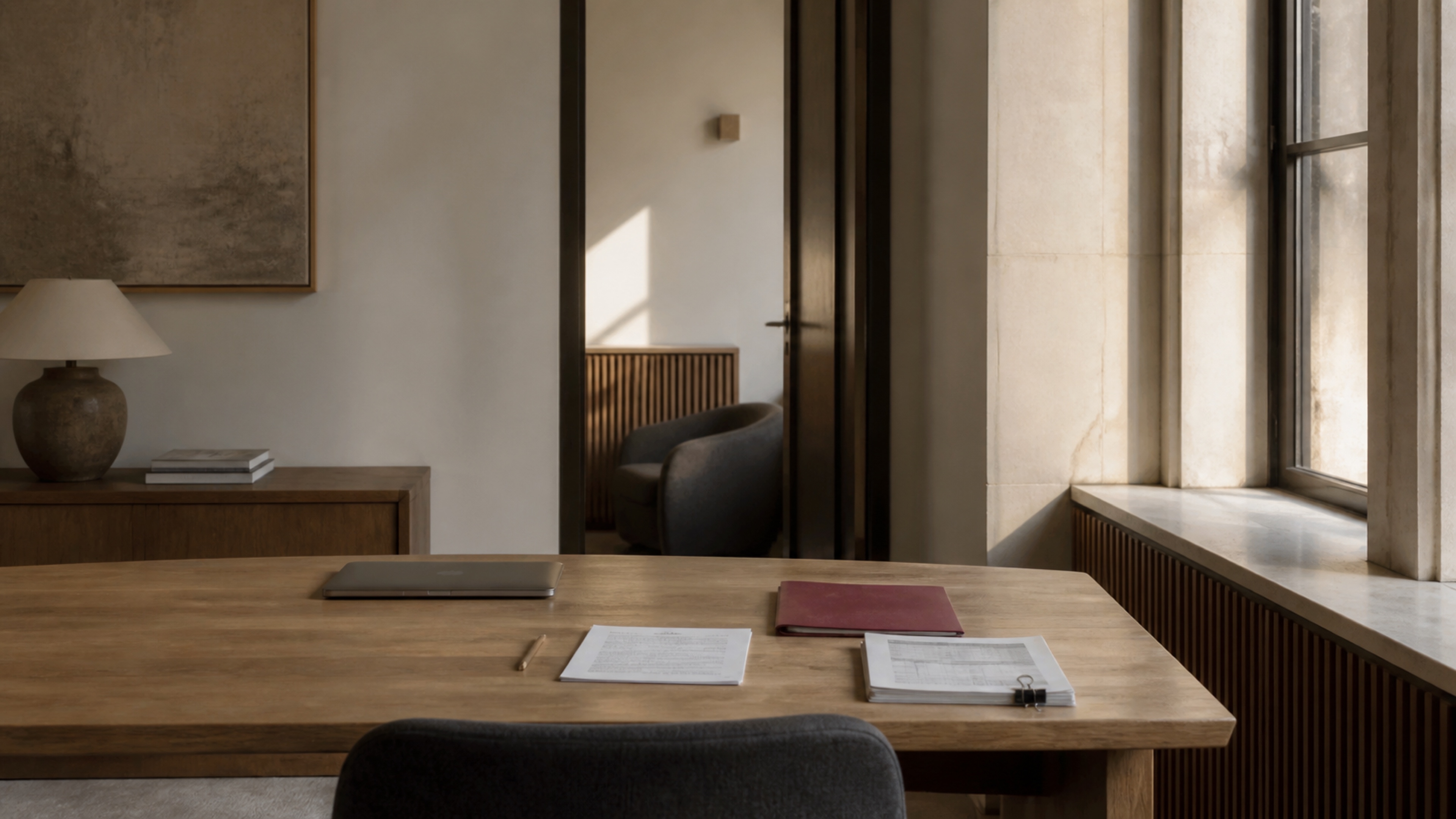 A disciplined founder workspace with notices, an evidence pack and a burgundy binder